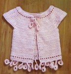 Dancing poppies baby bolero, crocheted by Marjoleinf
